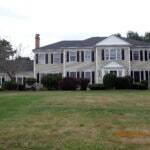 large house newly serviced with roof and siding