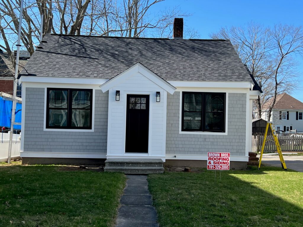 Siding & roofing installed on house