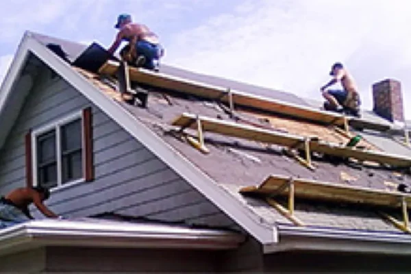phases3 two men working on roof